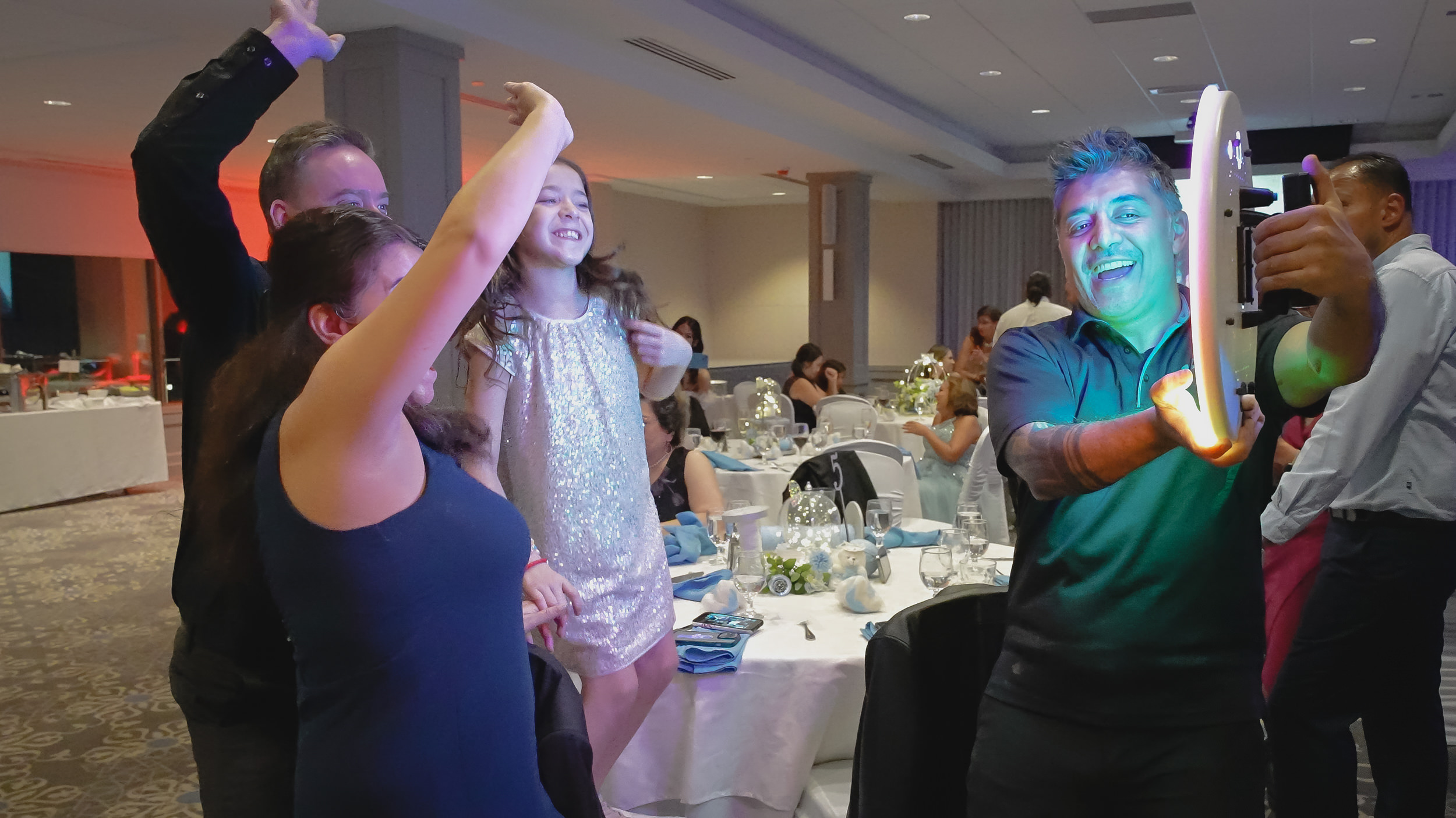 Ring Roamer capturing family moment at reception