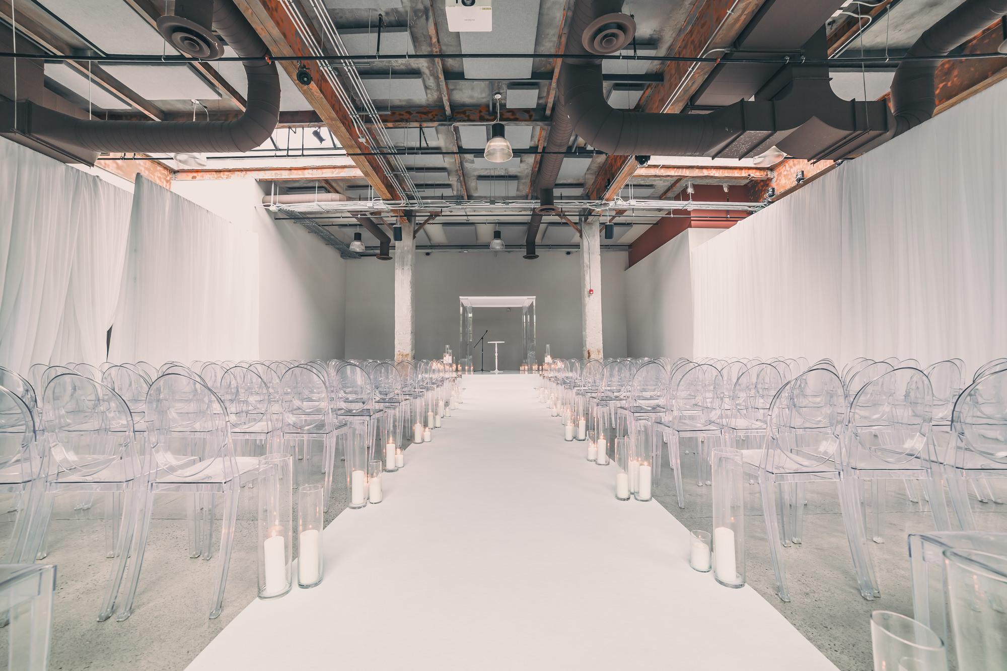 The Symes minimalist all-white wedding ceremony setup